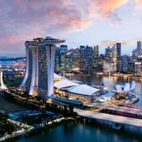 A skyline of the city of Singapore at dusk